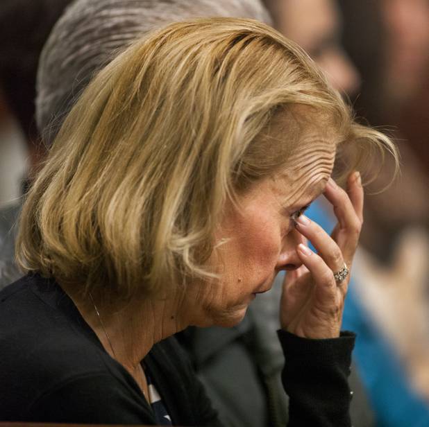 Colin Lowrey's mother does her best keep poised during his bail setting in Henderson Justice Court which she was hoping to be reduced Wednesday, Nov. 6, 2013.